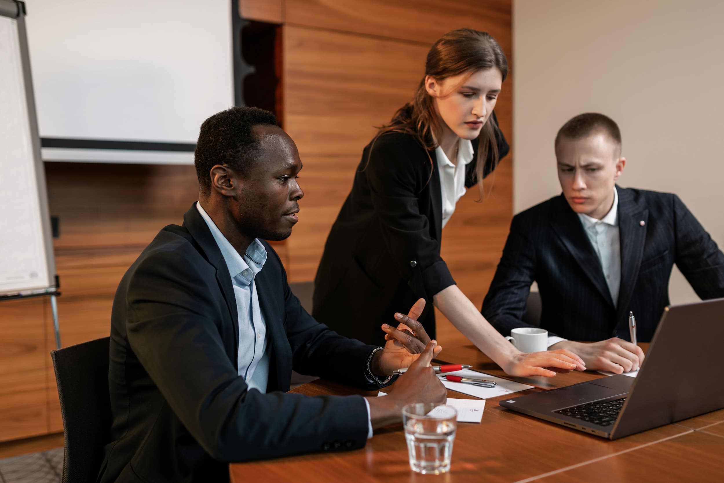 Operations and middle office professionals collaborating in financial services