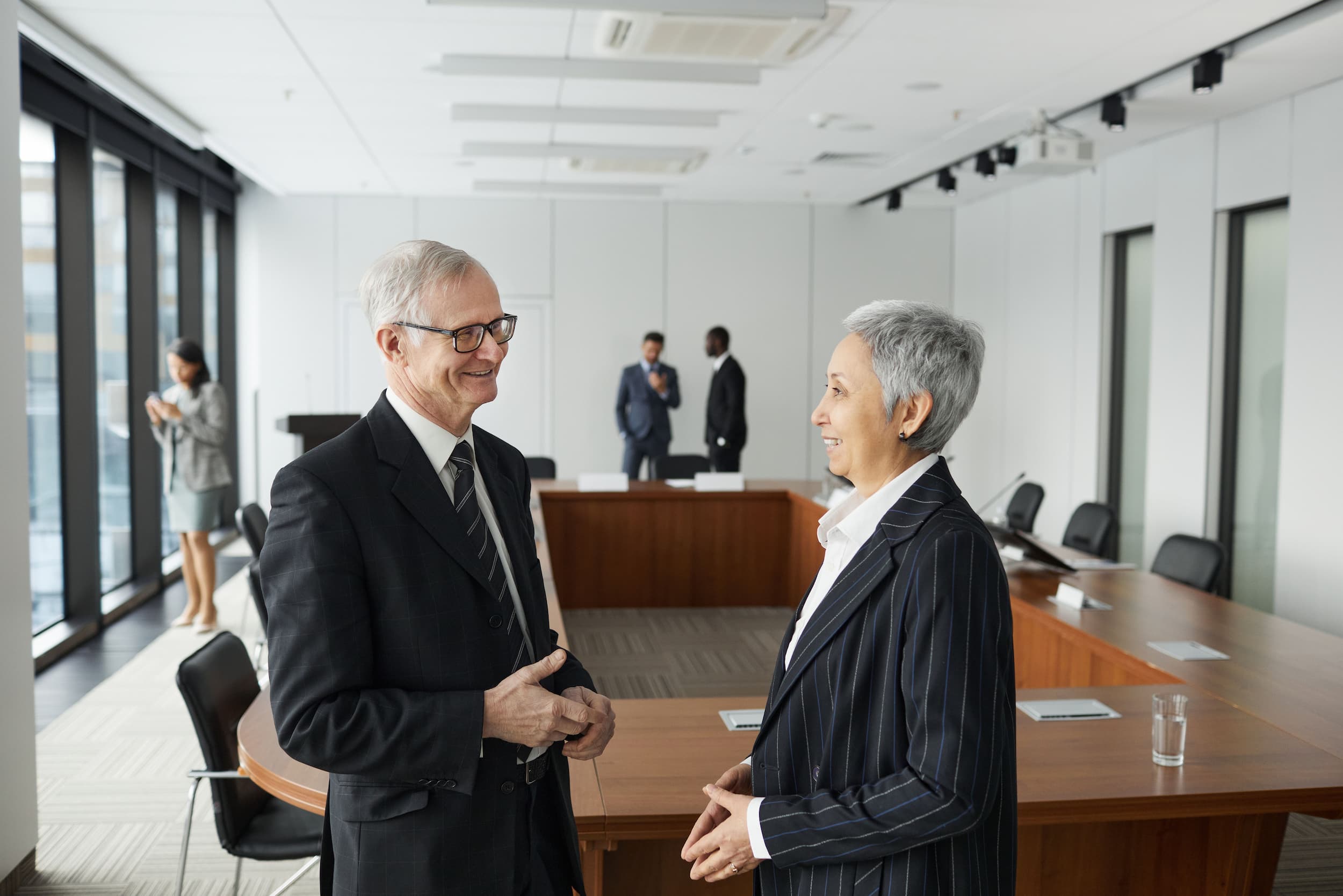 pexels-werner-pfennig-6950049 (1) Financial services executives discussing risk management and leadership