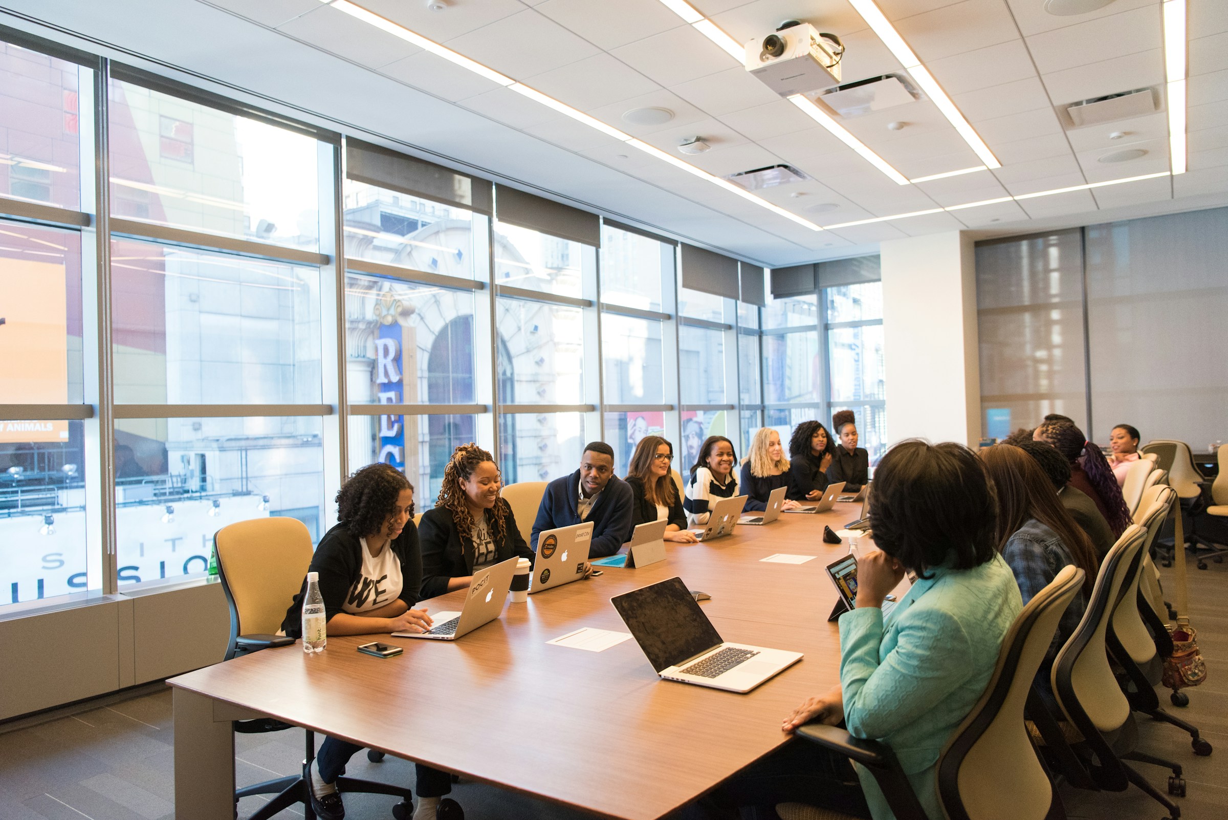 Financial services professionals collaborating across an alternative investment business