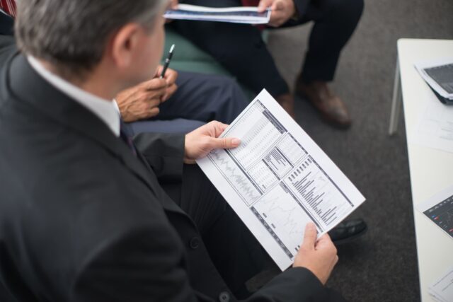 Reviewing fund financial reports with an in house CFO, Ramax Search and Staffing